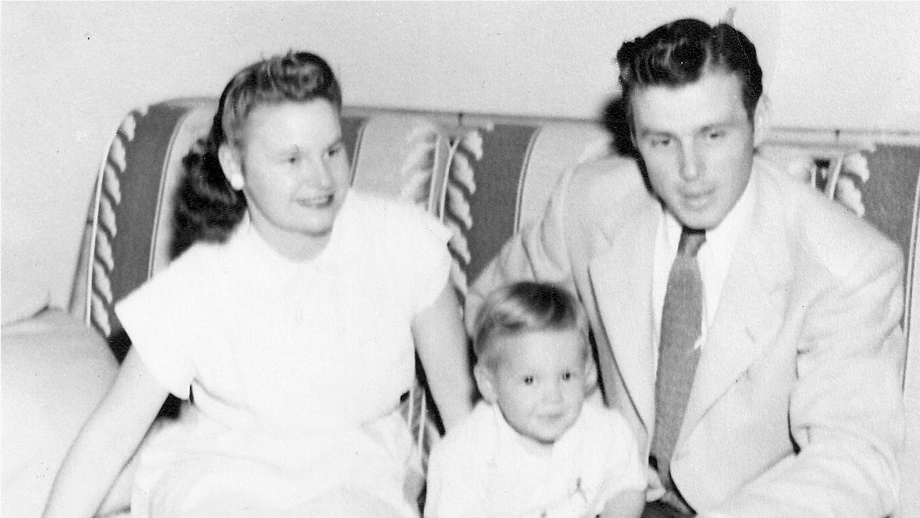 A photo of Hal Downes (R) with his wife, Elinor Lee (L) and young son, Richard (C).