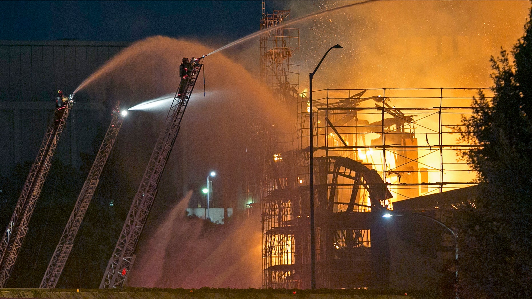 Dec. 8, 2014: Los Angeles firefighters battle a fire in the seven-story Da Vinci apartment complex under construction in downtown Los Angeles.