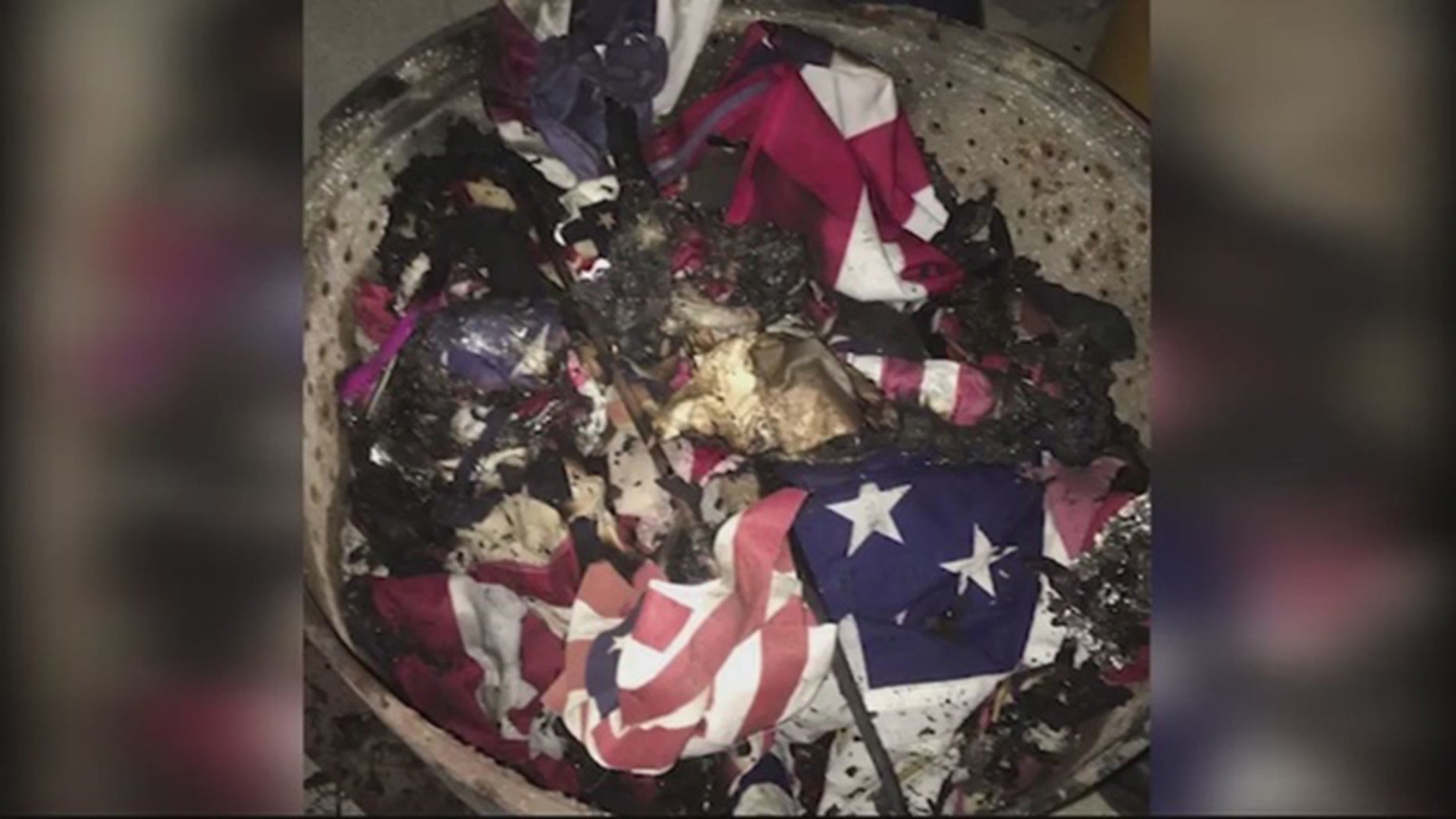 Dozens of American flags were set on fire at a Los Angeles veterans park.