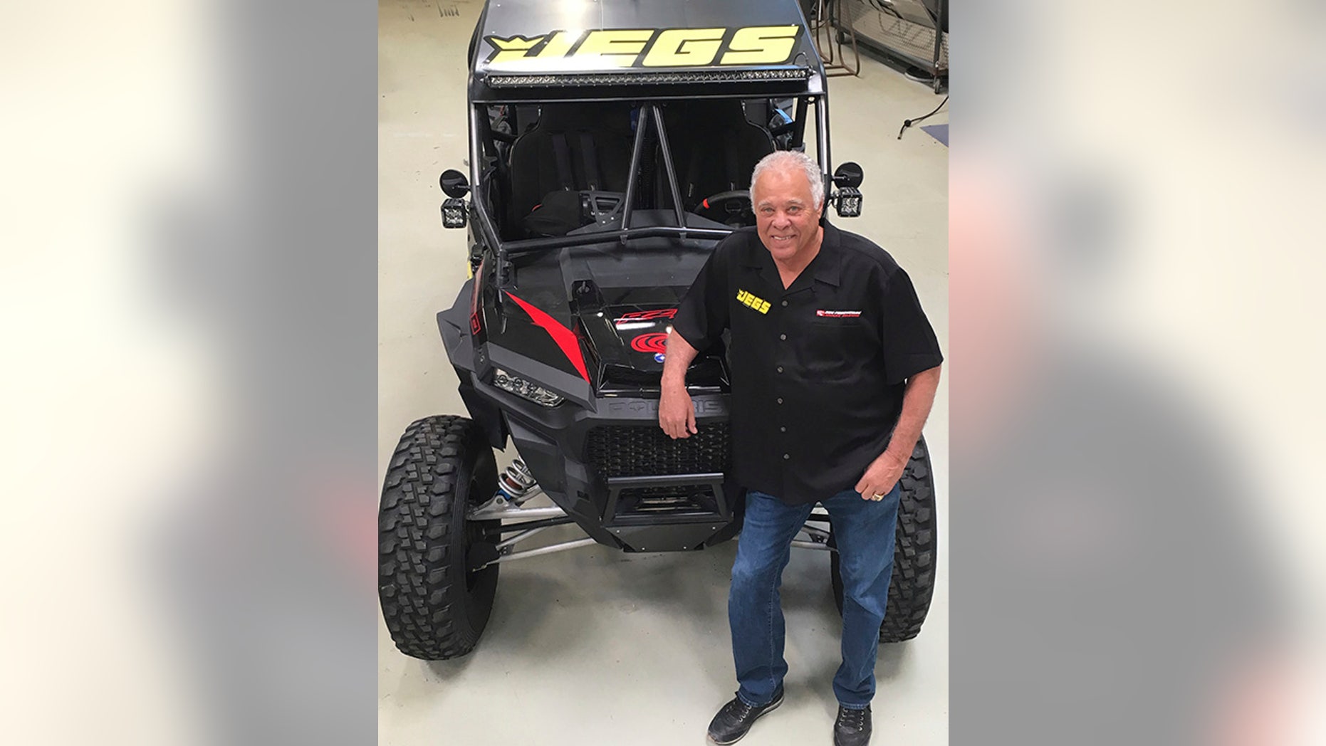 This photo provided by Don Prudhomme Racing shows Don Prudhomme posed at his shop in Vista, Calif., in March 2018. Don Prudhomme had no clue what he was doing the first time he entered the Baja 1000. The legendary drag racer made it about 100 miles before blowing an engine. Now, 50 years later, he gets to try again. The 77-year-old Prudhomme will return to Baja for the Mexican 1000 next week, his first competitive race since retiring from NHRA in 1994. (Donna Prudhomme/Don Prudhomme Racing via AP)