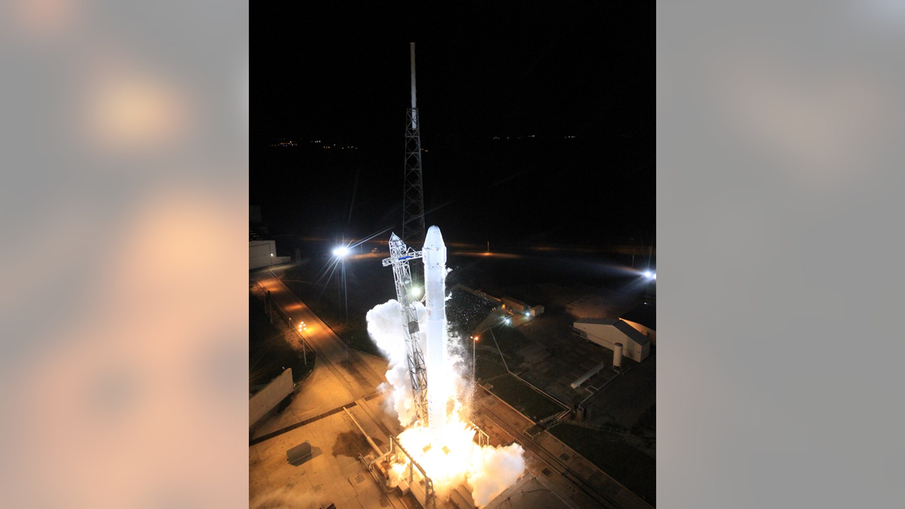 A view looking down at SpaceX's Dragon capsule as it lifts off the pad on Oct. 7, 2012.