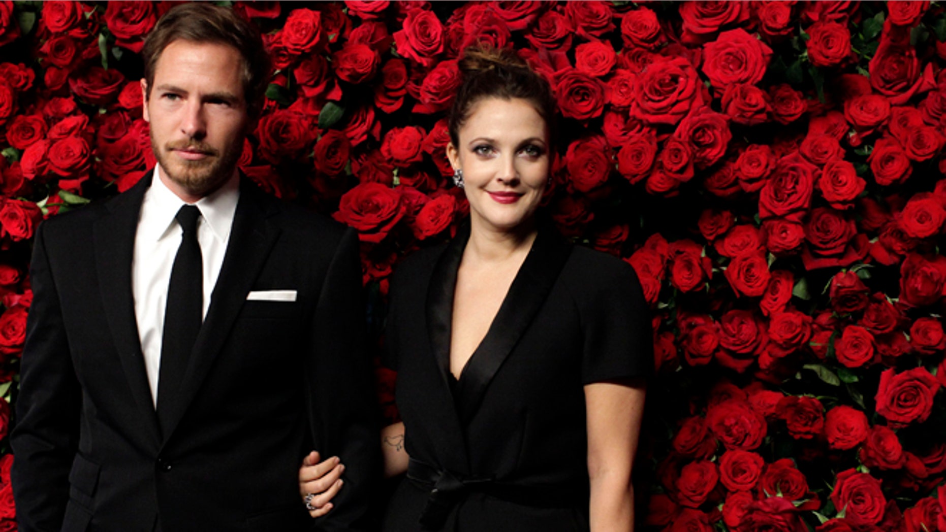 November 15, 2011. Actress Drew Barrymore (R) and Will Kopelman (L) attend the Museum of Modern Art's fourth annual Film Benefit in New York.