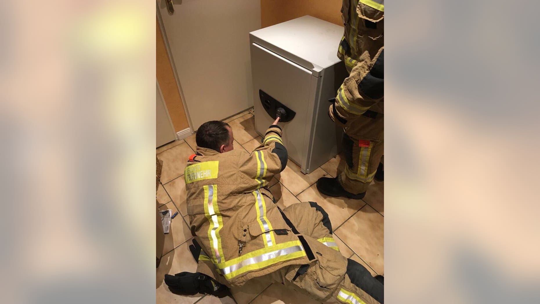 Firefighters were able to crack the code to free a boy who locked himself in the safe.