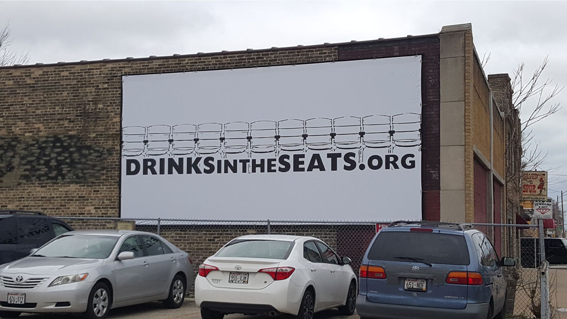 Ryan Strnad is hoping his billboards will bring awareness to the plight of Miller Park's beer vendors.