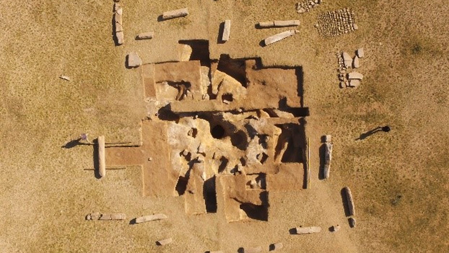 Drone footage show 14 mysterious stone pillars unearthed in the Mongolian steppe that provide clues to ancient power struggles. Segments of the inscriptions and sarcophagus excavated from the hole at the center of the ruins can be seen.