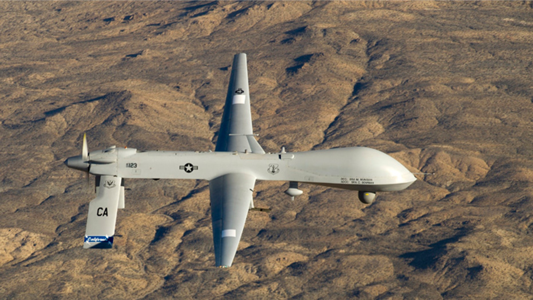 FILE 2013: A U.S. Air Force MQ-1 Predator unmanned aerial vehicle assigned to the California Air National Guard's 163rd Reconnaissance Wing flies near the Southern California Logistics Airport in Victorville, California.
