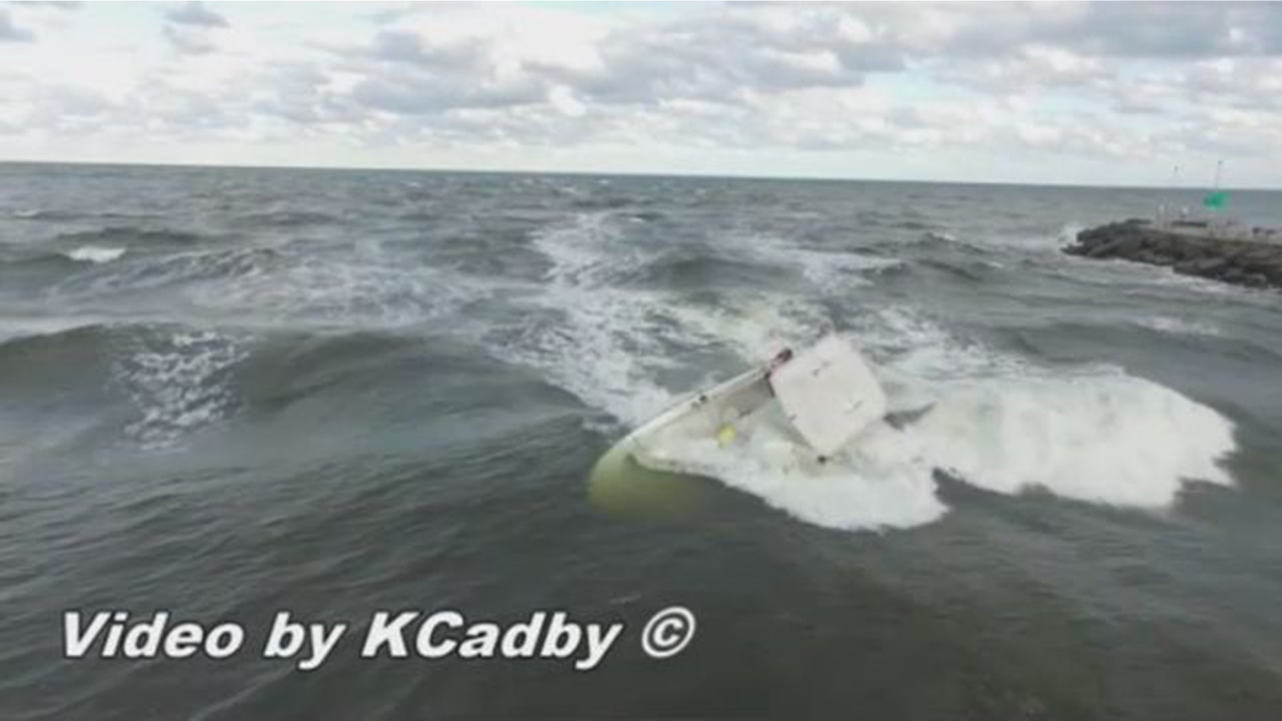 A drone captured video of a boat capsizing in Florida and a daring rescue by a nearby 13-year-old surfer. (Kevin Cadby)