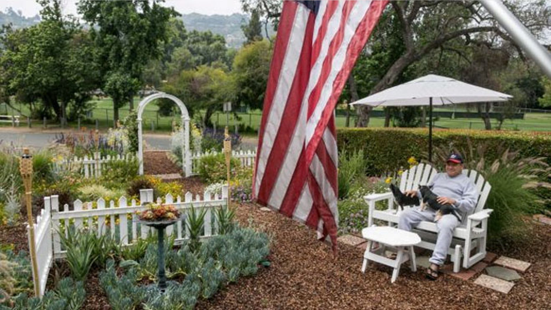 May 27, 2015: Retired Department of Motor Vehicle customer service representative Raymond Aleman sits in his drought resistant garden in the Studio City neighborhood in Los Angeles.