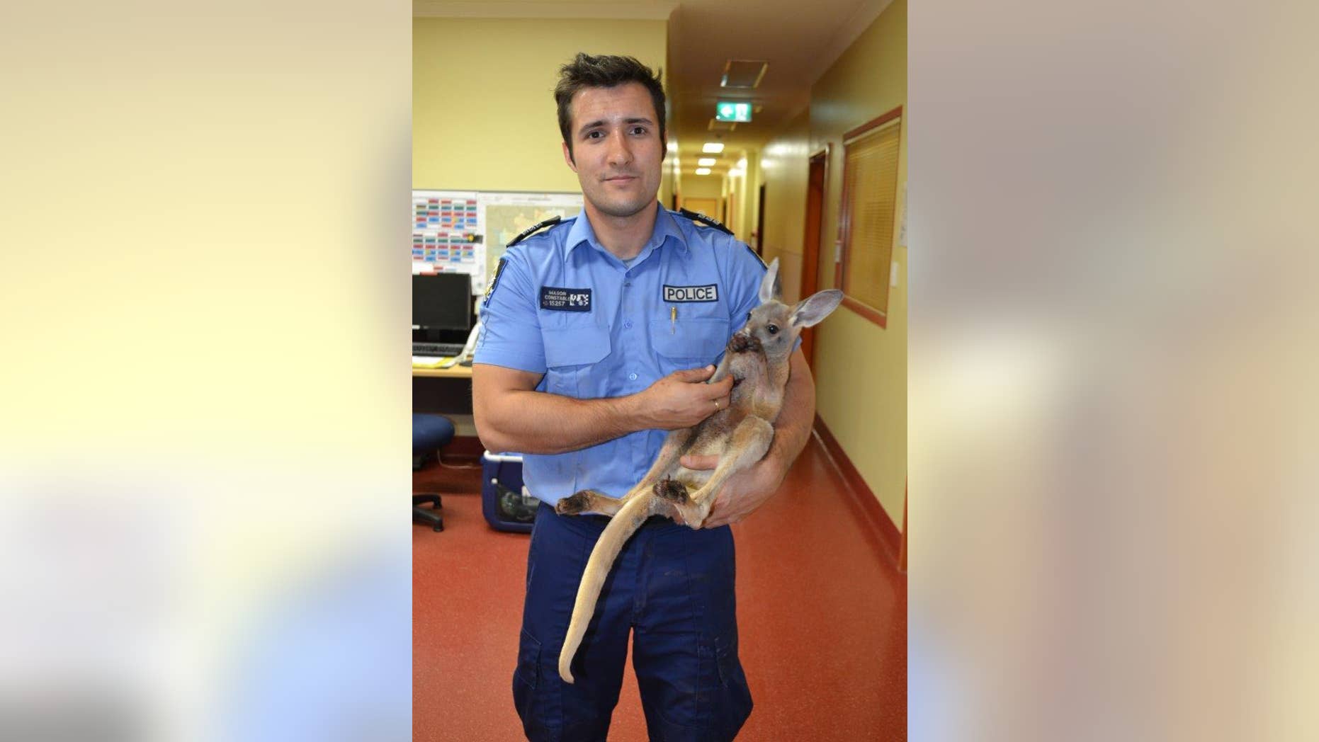 Constable Scott Mason and Cuejoe. (Western Australia Police)