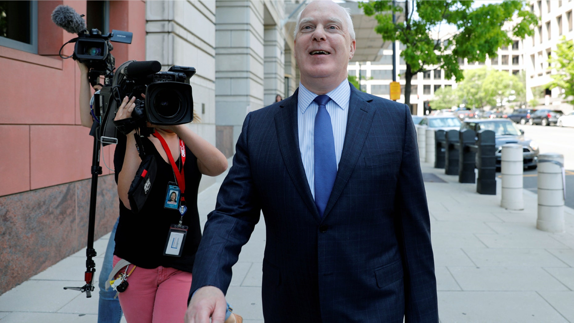 Lawyer Eric Dubelier leaves U.S. District Court in Washington last week after entering a not guilty plea on behalf of Concord Management and Consulting LLC
