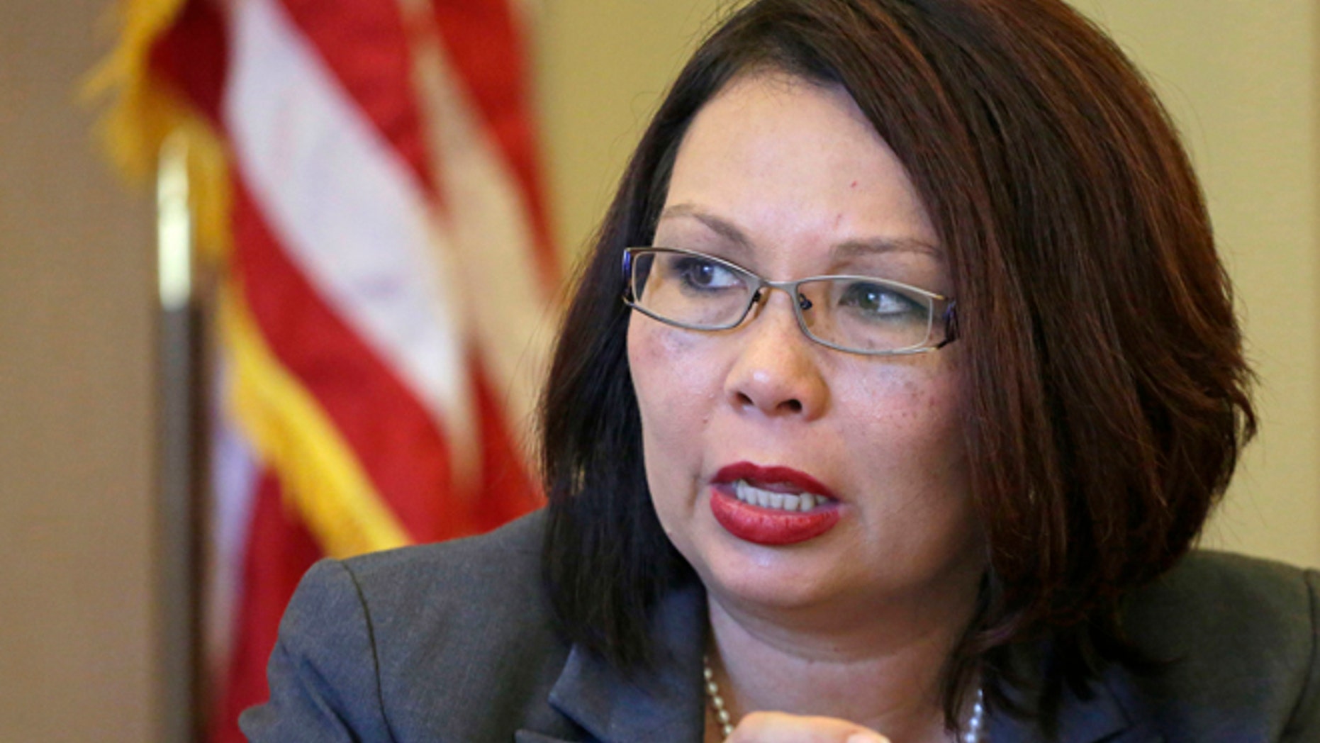 July 31, 2015 file photo: U.S. Rep. Tammy Duckworth D-Ill., appears before the Chicago City Council's finance committee.