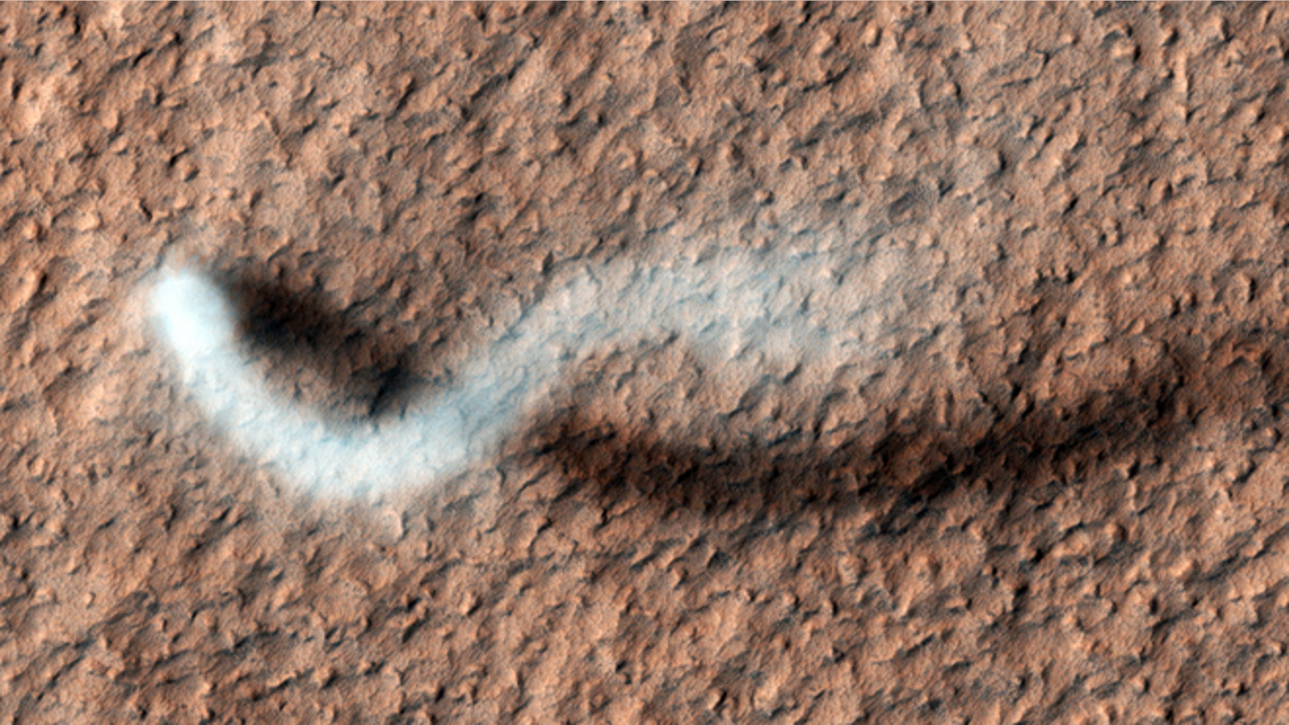 A towering dust devil casts a serpentine shadow over the Martian surface in this stunning, late springtime image captured recently by NASA. But how would it sound?
