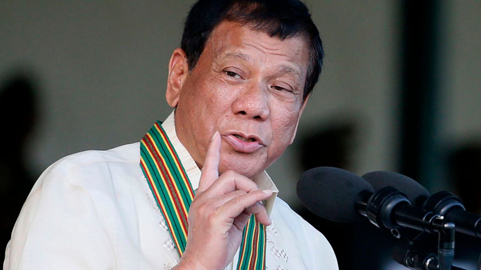 April 4, 2017 Philippine President Rodrigo Duterte gestures while addressing army troopers during the 120th anniversary celebration of the Philippine Army at Fort Bonifacio in suburban Taguig city, east of Manila.