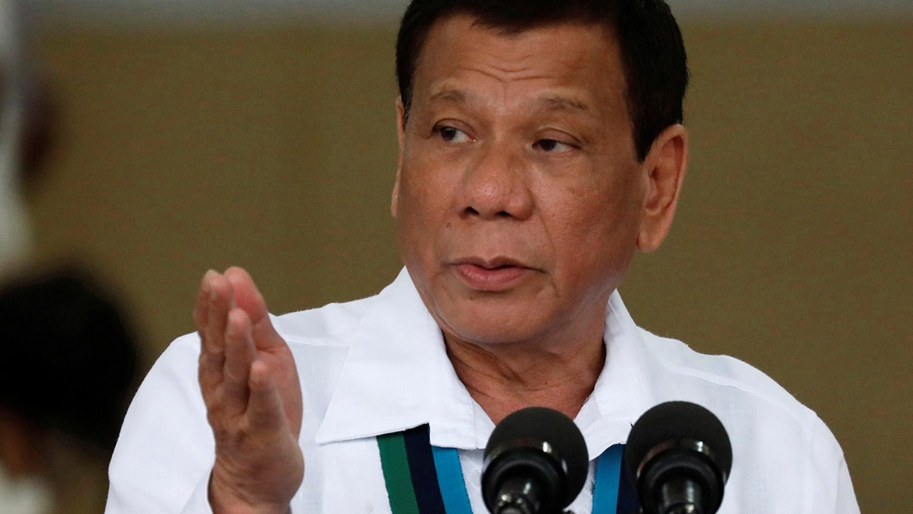Philippines President Rodrigo Duterte gestures during Change of Command ceremonies of the Armed Forces of the Philippines (AFP) at Camp Aguinaldo in Quezon City, metro Manila, Philippines, Oct. 26, 2017.