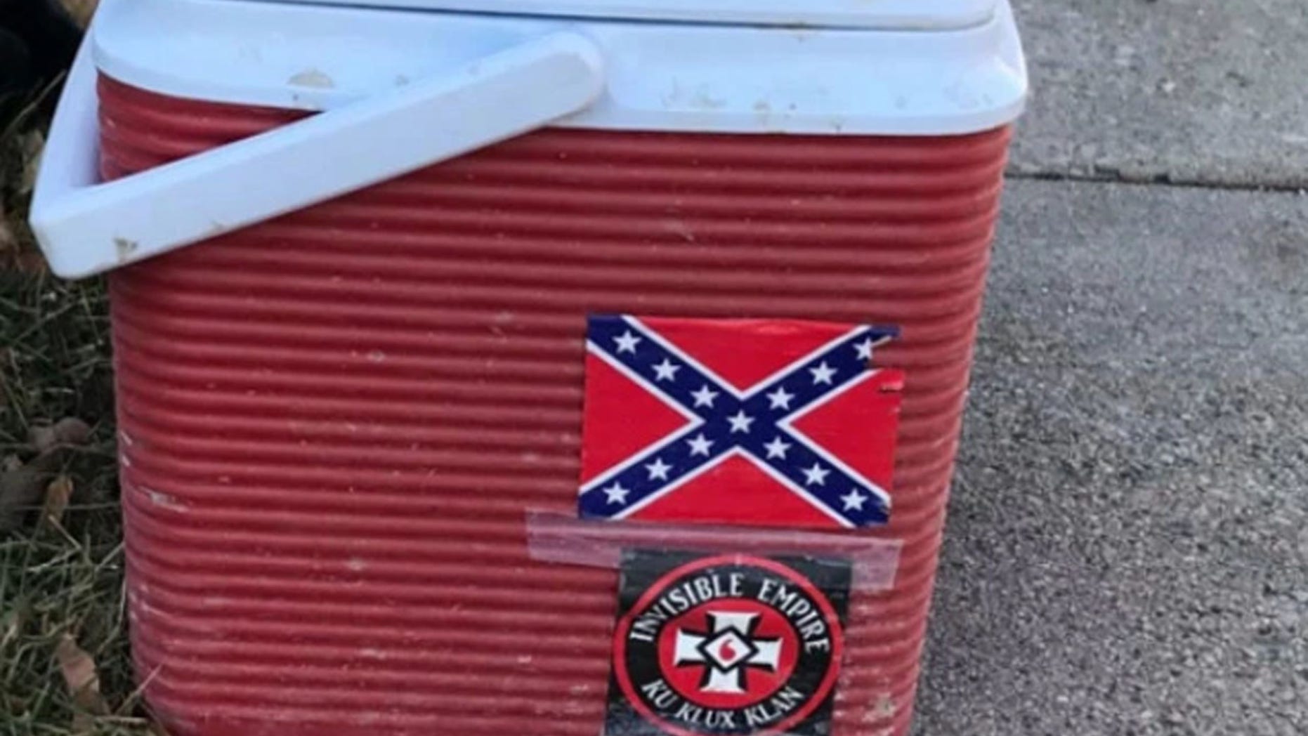 A worker lost his job after his cooler with “offensive” Ku Klux Klan and Confederate flag stickers was spotted, city officials said.