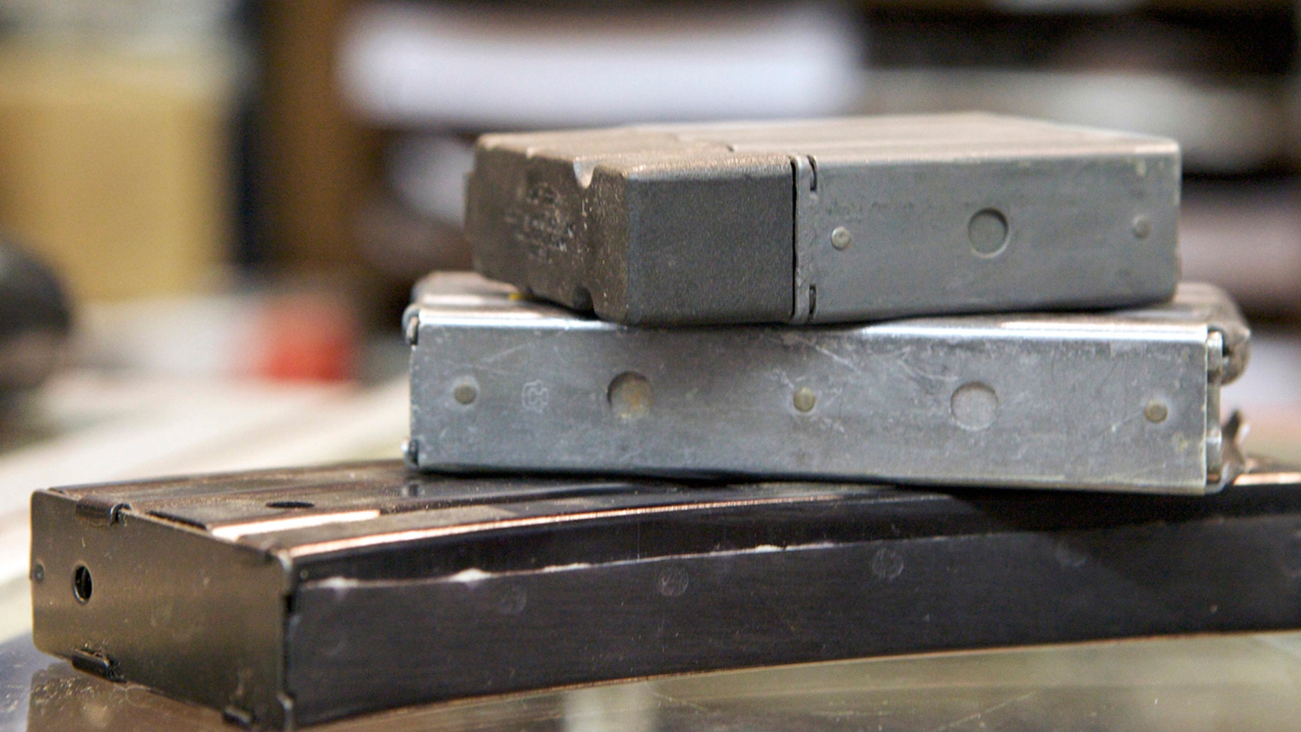 FILE: AR-15 type rifle magazines, (top to bottom) 10-round, 20-round and 30-round