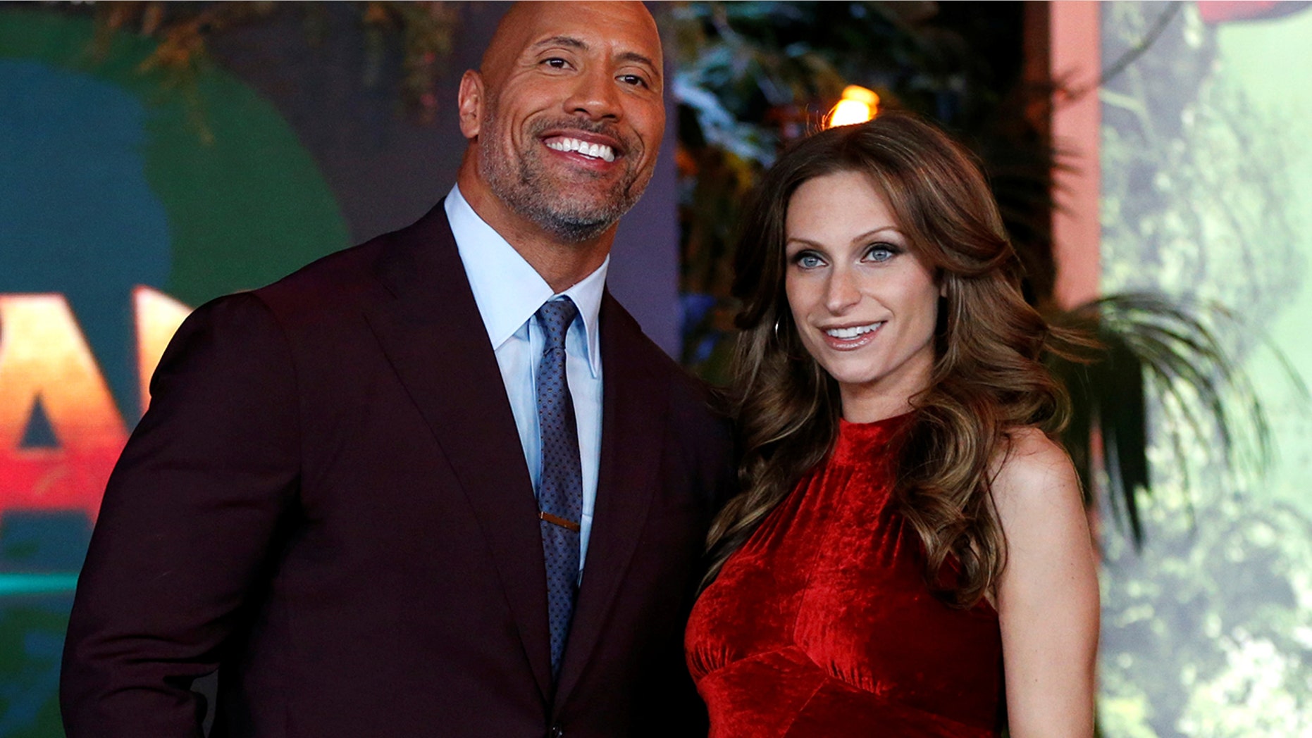 Cast member Dwayne Johnson and Lauren Hashian pose at the premiere for "Jumanji: Welcome to the Jungle" in Los Angeles, California, U.S., December 11, 2017.