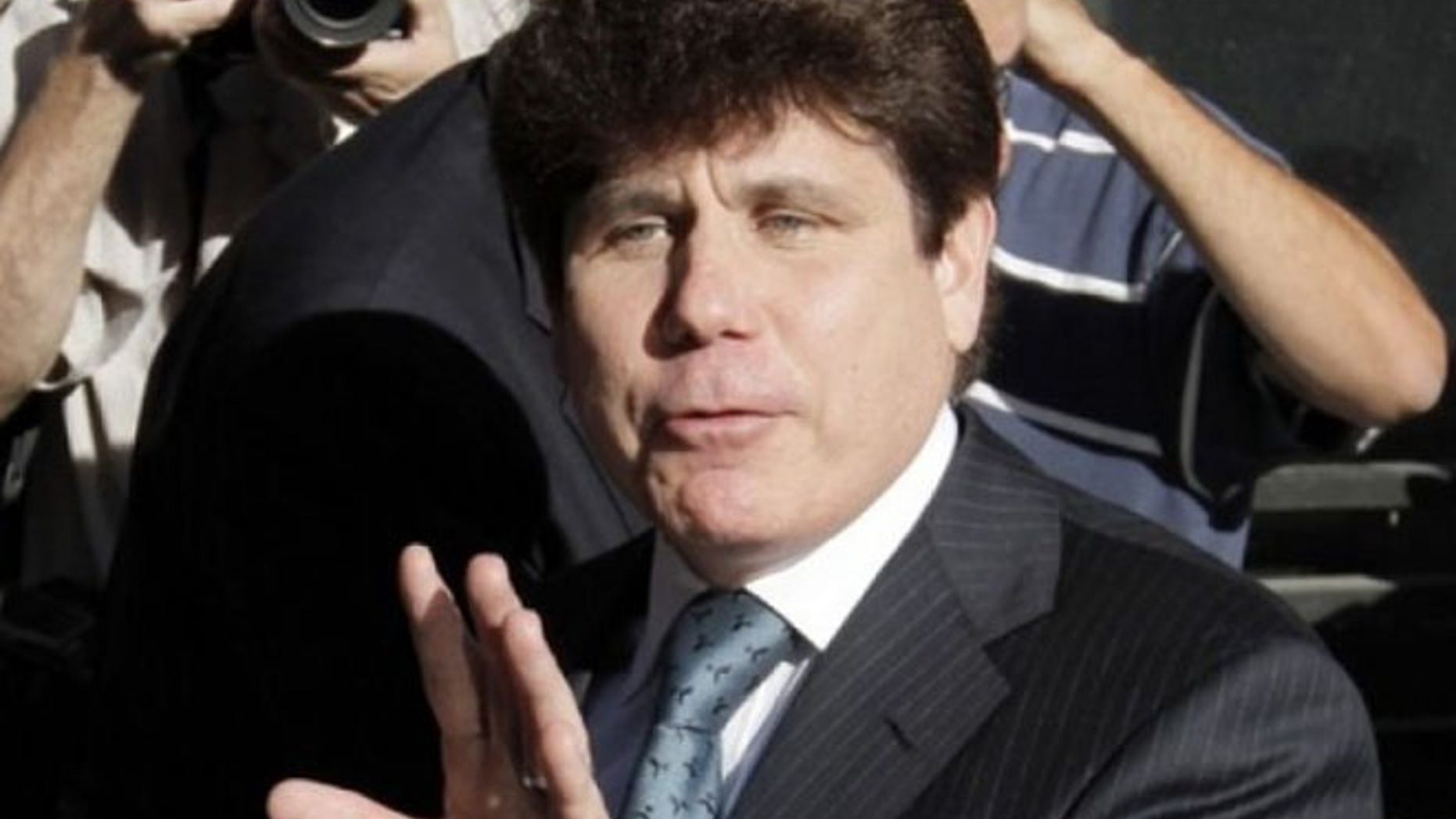 FILE: Rod Blagojevich is in the fourth year of a 14-year sentence on corruption convictions, including for trying to sell Obama's U.S. Senate seat after he became president.
