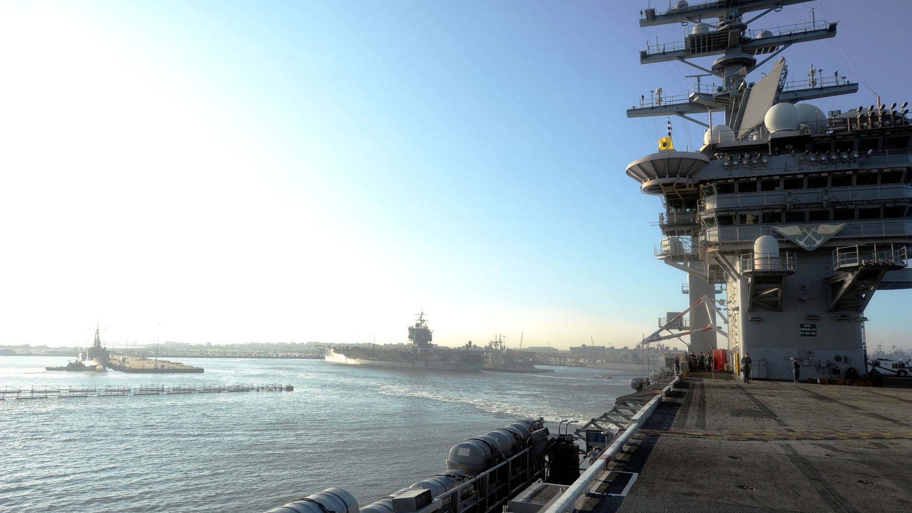 Aug. 25, 2011: The aircraft carrier USS Dwight D. Eisenhower departs Naval Station ahead of the possible landing of Hurricane Irene.