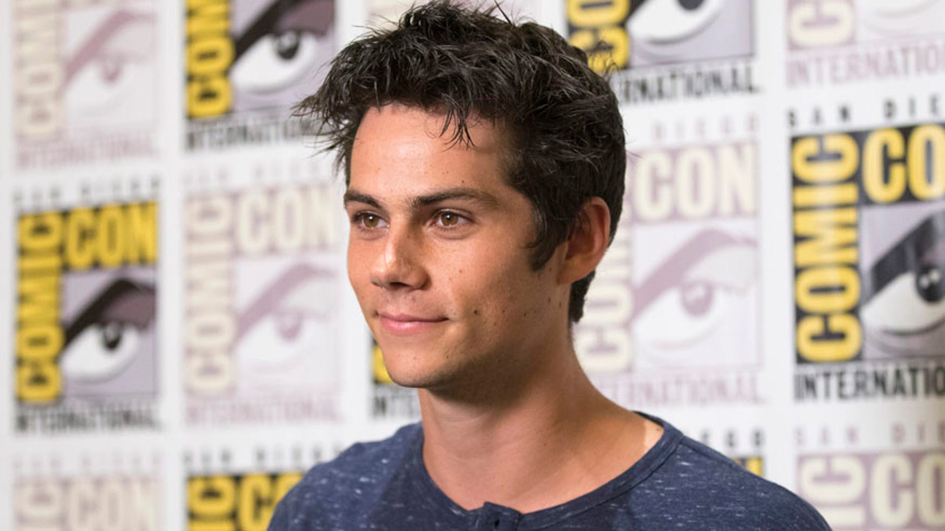 Cast member Dylan O'Brien poses at a press line for "The Maze Runner" during the 2014 Comic-Con International Convention in San Diego, California July 25, 2014. REUTERS/Mario Anzuoni (UNITED STATES - Tags: ENTERTAINMENT) - RTR406BA