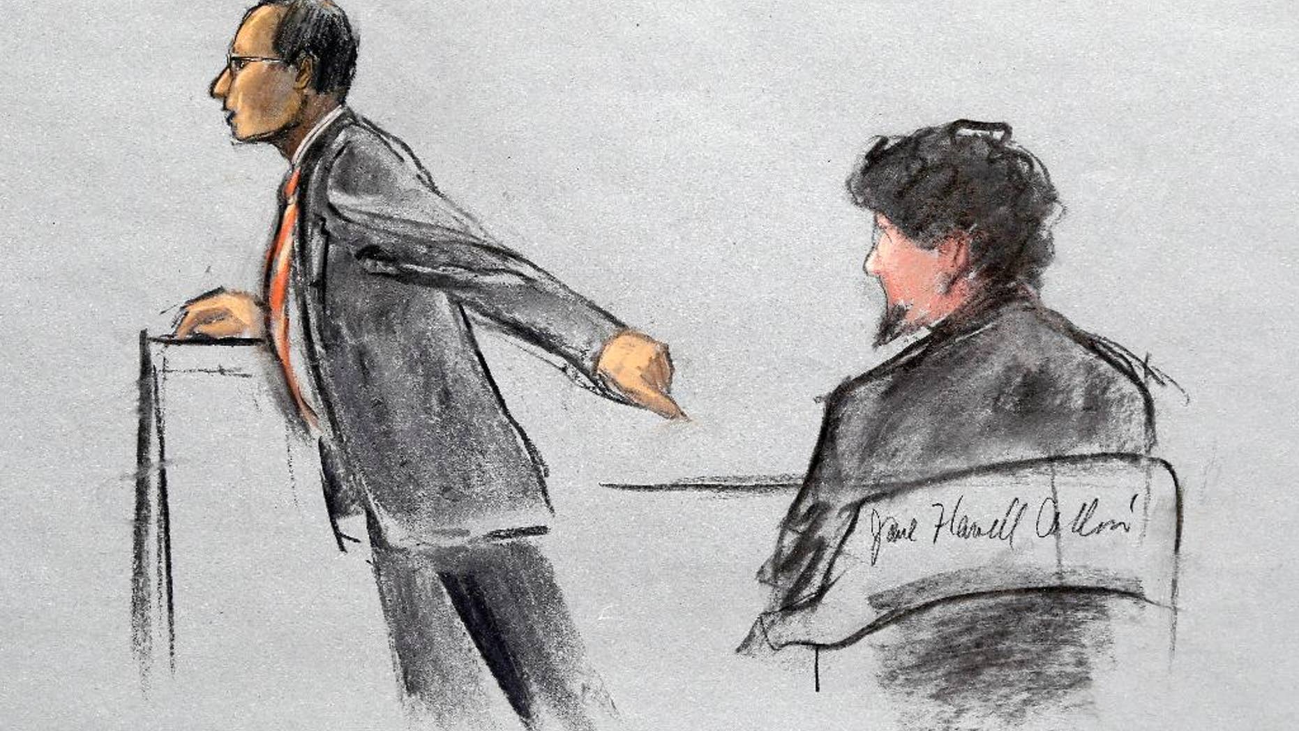 A Boston police officer patrols with his dog outside federal court in Boston as closing arguments are underway in the federal death penalty trial of Boston Marathon bombing suspect Dzhokhar Tsarnaev, Monday, April 6, 2015. Tsarnaev is charged with conspiring with his brother to place two bombs near the marathon finish line in April 2013, killing three and injuring 260 people. (AP Photo/Elise Amendola)