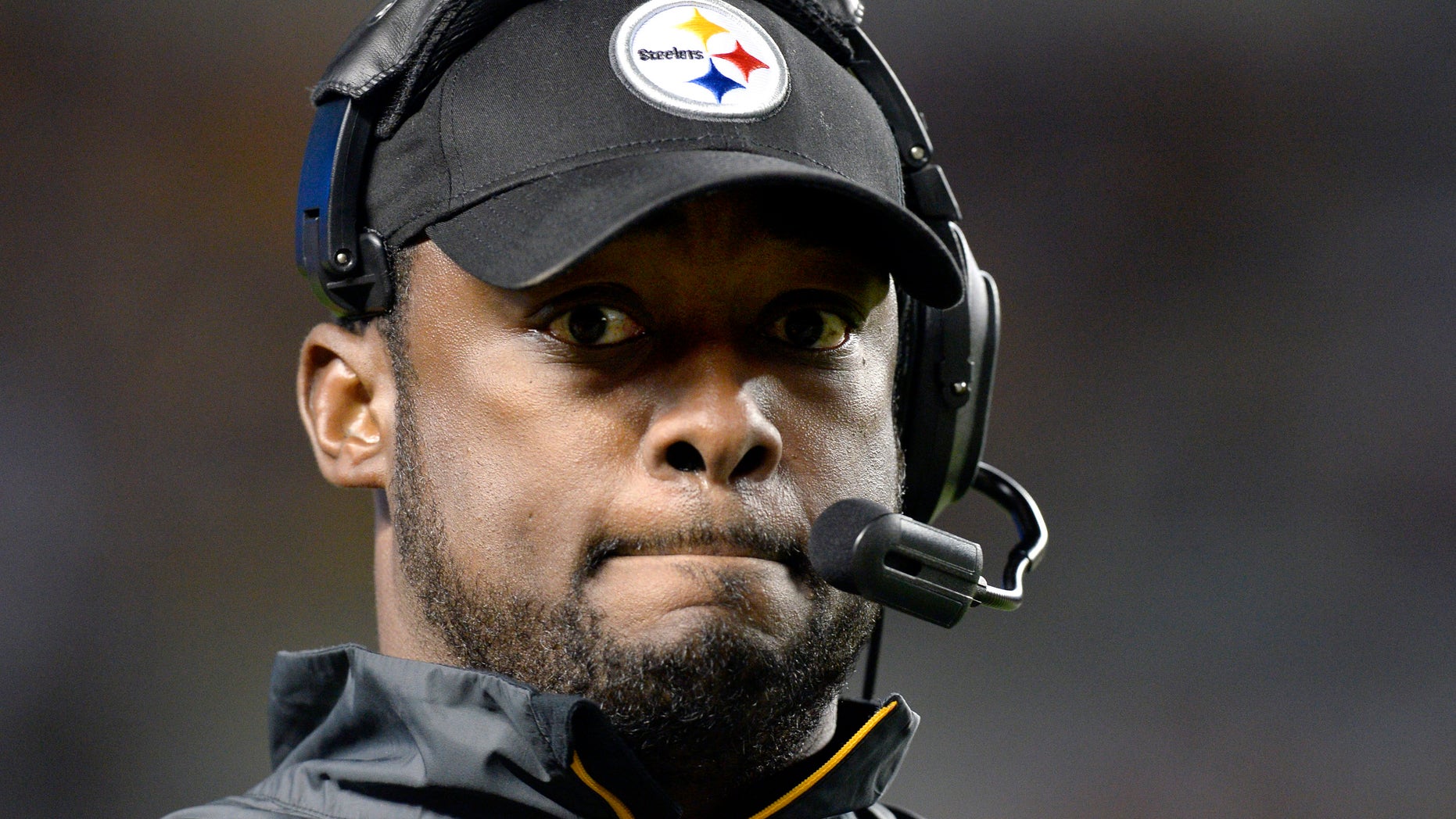 ADVANCE FOR WEEKEND EDITIONS, OCT. 5-6 - FILE - In this Sept. 22, 2013, file photo, Pittsburgh Steelers head coach Mike Tomlin walks the sideline while his team is losing to the Chicago Bears in the fourth quarter of an NFL football game in Pittsburgh. Tomlin describes himself as a man of "great patience." He will need it to endure the franchise's worst start in 45 years. (AP Photo/Don Wright, File)