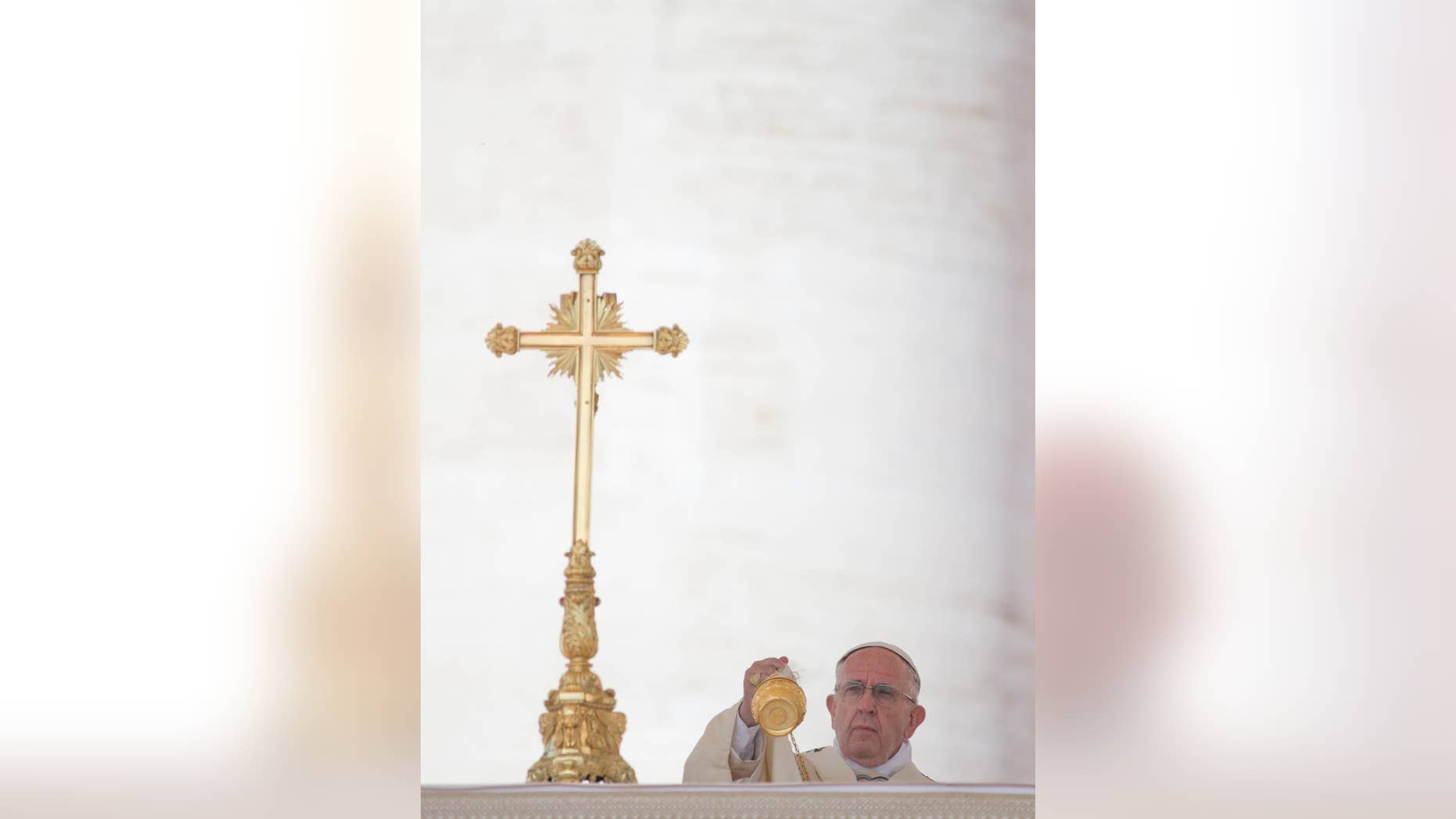 Pope Francis asperses incense as he arrives in St. Peter's Square at the Vatican for a canonization ceremony, Sunday, June 5, 2016. Pope Francis has canonized Elizabeth Hesselblad, a Lutheran convert who hid Jews during World War II and Stanislaus, the founder of the first men's religious order dedicated to the immaculate conception. (AP Photo/Alessandra Tarantino)