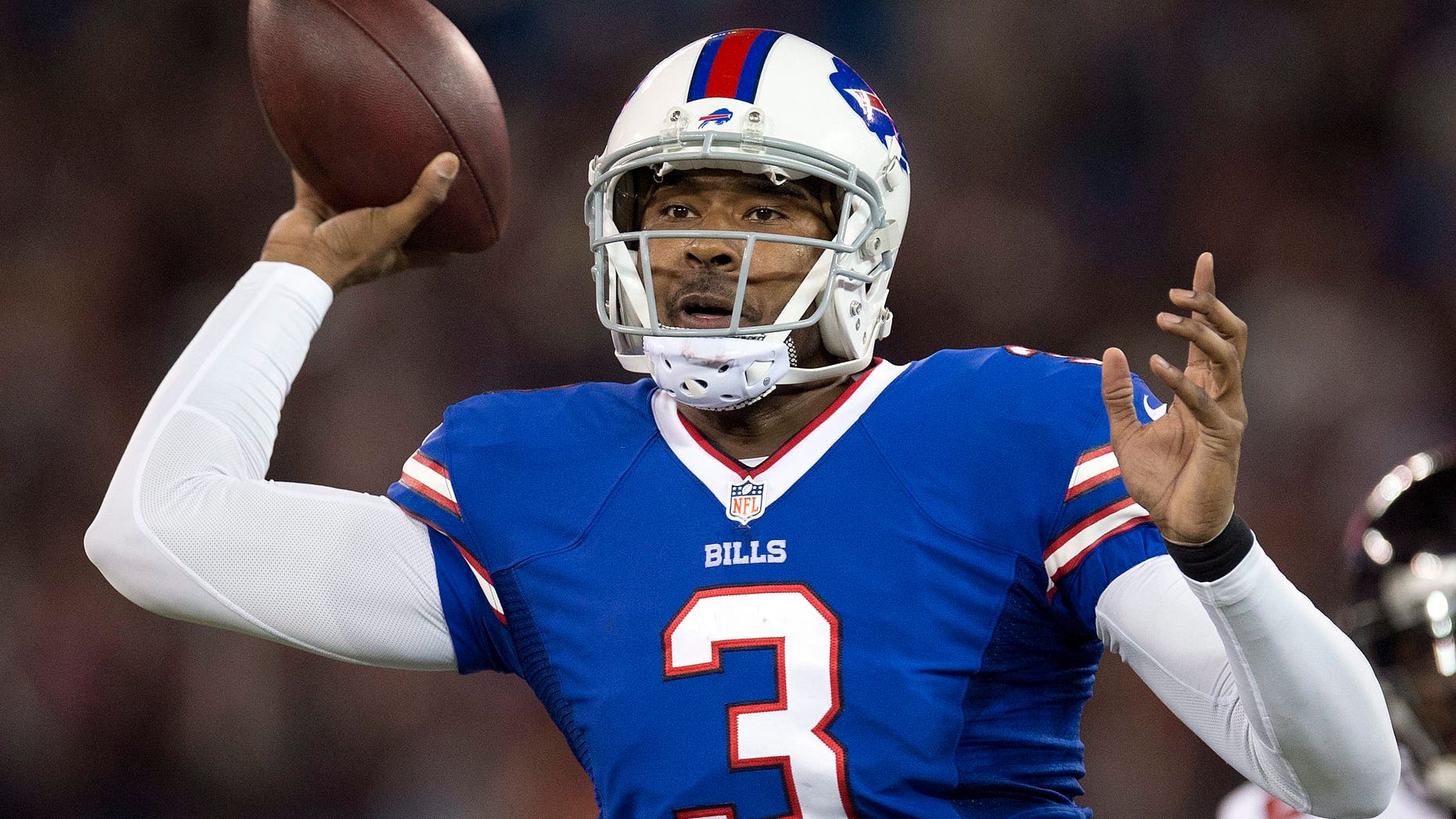 Buffalo Bills quarterback EJ Manuel launches a pass against the Atlanta Falcons during first half NFL football action in Toronto on Sunday Dec. 1, 2013. (AP Photo/The Canadian Press, Frank Gunn)