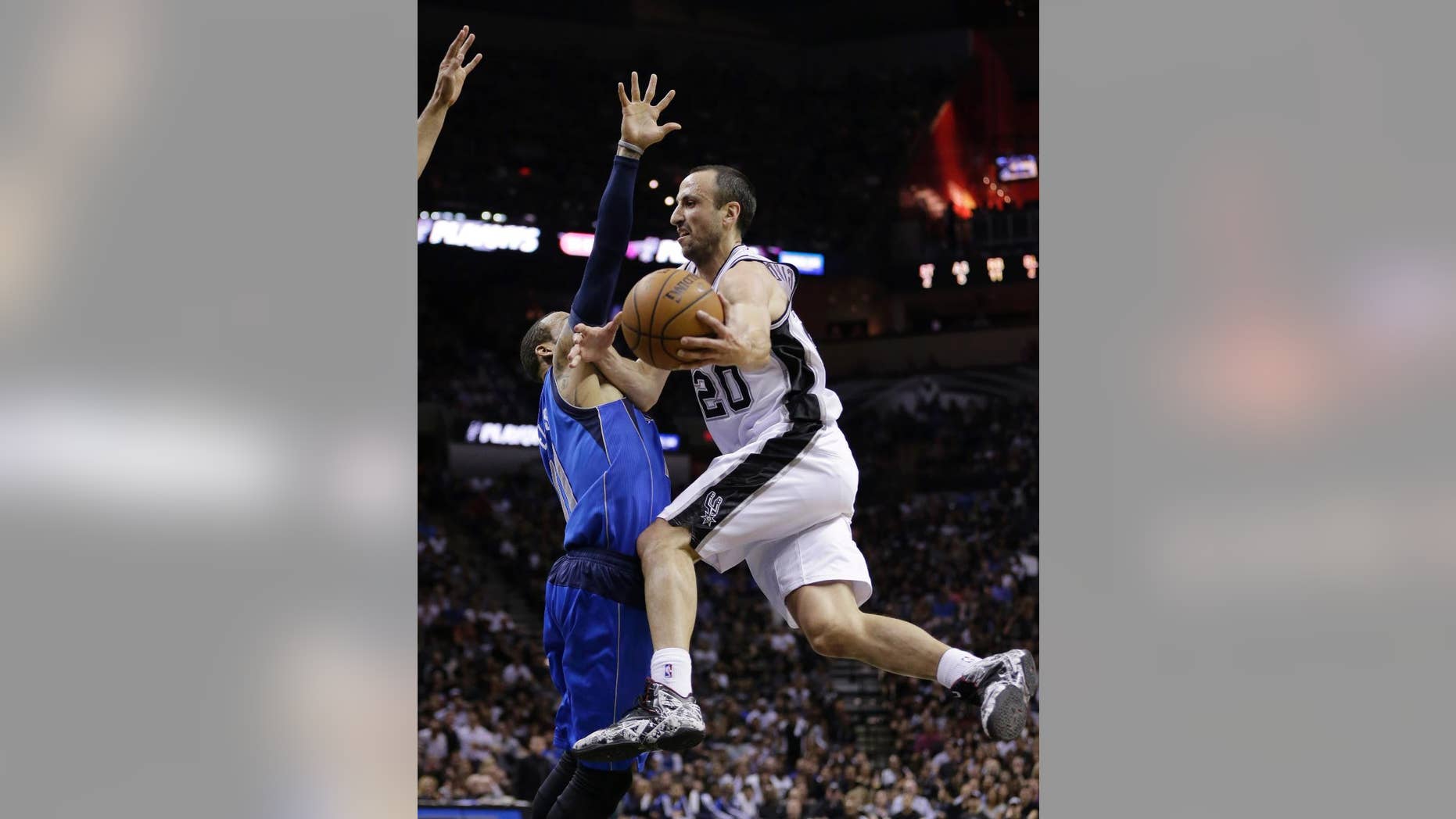 San Antonio Spurs' Manu Ginobili (20), of Argentina, drive around Dallas Mavericks' Monta Ellis (11) during the first half of Game 7 of the opening-round NBA basketball playoff series, Sunday, May 4, 2014, in San Antonio. (AP Photo/Eric Gay)