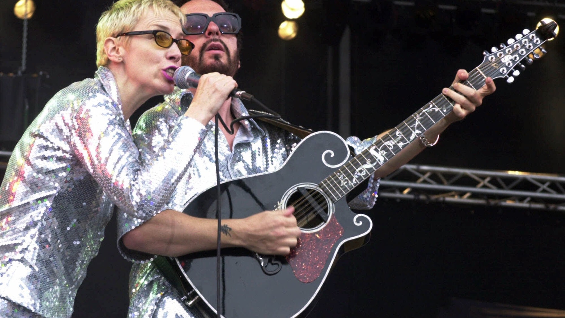 File- This June 10, 2000, file photo shows Annie Lennox, left, and Dave Stewart as the Eurythmics performing on stage at the Rock at the Ring three-day music festival at the Nuerburgring race circuit in Nuerburg, Germany. The Eurythmics are reuniting to pay tribute to the Beatles. The Recording Academy announced Monday Jan. 6, 2014, that Lennox and Stewart will perform as a duo for "The Night That Changed America: A Grammy Salute To The Beatles.” The event will tape at the Los Angeles Convention Center on Jan. 27, a day after the Grammy Awards. (AP Photo/Pool)