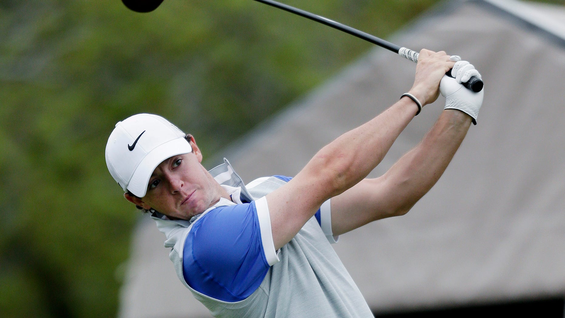 Rory McIlroy, of Northern Ireland, watches his tee shot on the 1st hole during the final round of the Texas Open golf tournament, Sunday April 7, 2013, in San Antonio. (AP Photo/Eric Gay)