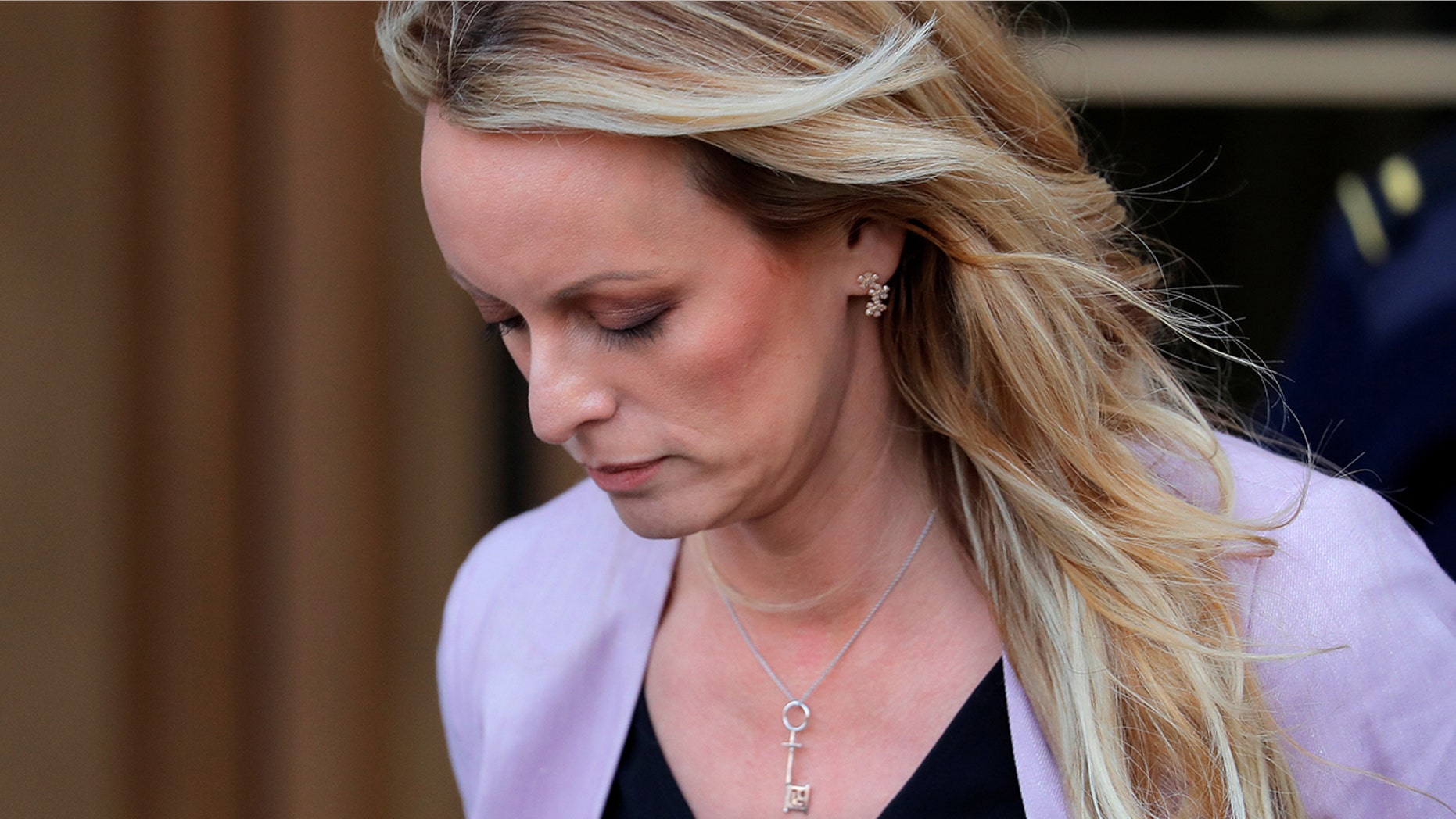 Stormy Daniels' key necklace have left many to wonder if there's a "hidden meaning" behind it.