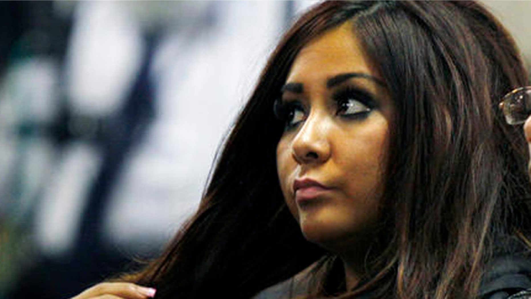 Sept. 8, 2010: Nicole Polizzi, better known as "Snooki" from the MTV show "Jersey Shore" sits in court in Seaside Heights, N.J.