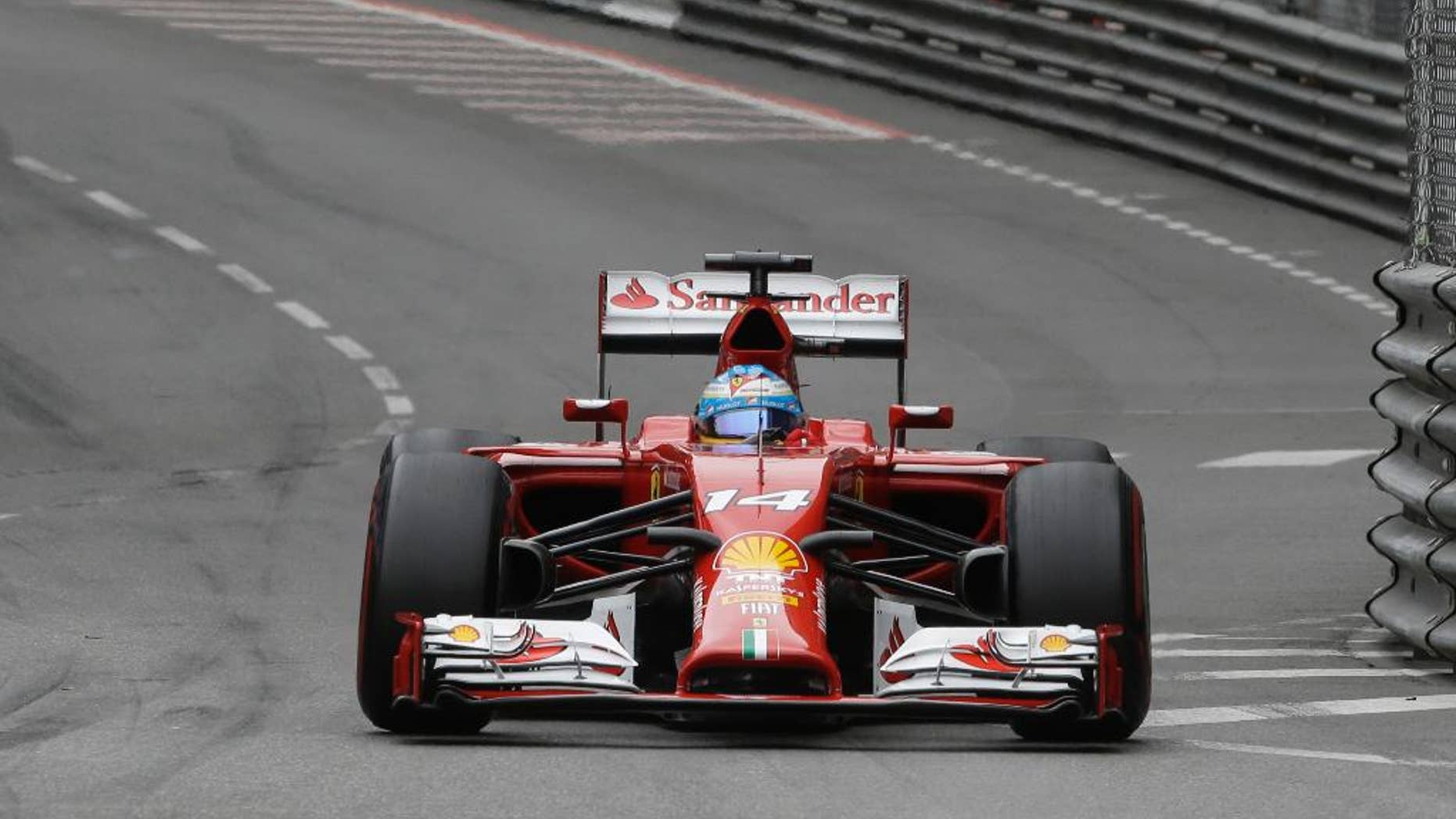 Ferrari driver Fernando Alonso of Spain steers his car during the Monaco Formula One Grand Prix, at the Monaco racetrack, in Monaco, Sunday, May 25, 2014. (AP Photo/Luca Bruno)