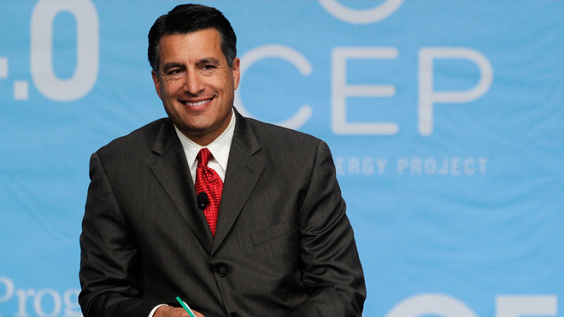 LAS VEGAS, NV - AUGUST 30: Nevada Gov. Brian Sandoval smiles during the National Clean Energy Summit 4.0 at the Aria Resort & Casino at CityCenter August 30, 2011 in Las Vegas, Nevada. Political and economic leaders are attending the summit to discuss a domestic policy agenda to advance alternative energy for the country's future. (Photo by Ethan Miller/Getty Images)