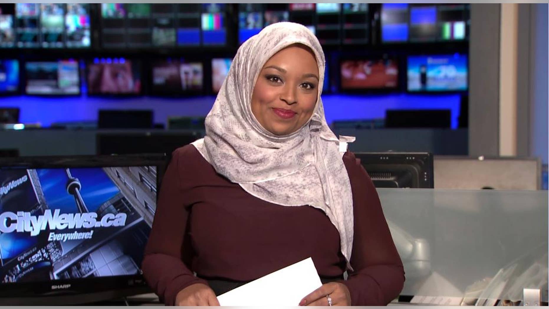 This image made from a video provided by CityNews shows Ginella Massa, a Toronto TV reporter who is believed to be Canada’s first anchor to don a Muslim head scarf at one of the city's major news broadcasters. Massa, 29, said Friday, Nov. 25, 2016, that she became Canada's first hijab-wearing television news reporter in 2015 while reporting for CTV News in Kitchener, Ontario, a city west of Toronto. She moved back to Toronto, where she grew up, earlier this year to take a reporting job at CityNews. (CityNews via AP)