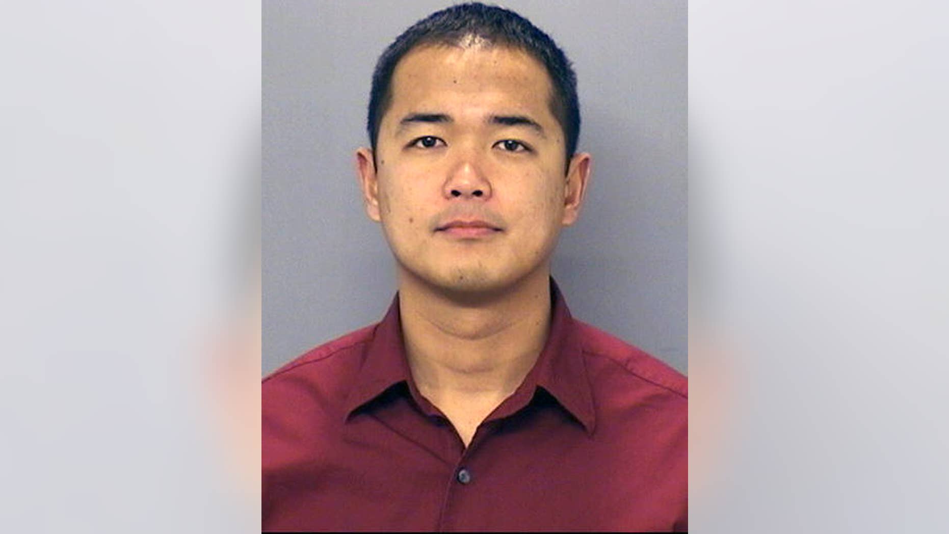 This undated photo provided by the San Diego Police Department shows San Diego Police officer Jonathan DeGuzman who was killed in a shooting Thursday, July 28, 2016. DeGuzman, a 16-year veteran, is survived by a wife and two young children. A suspect was wounded and taken into custody a short time later and hours later police surrounded a home as they searched for man described as a possible accomplice. (San Diego Police Department via AP)