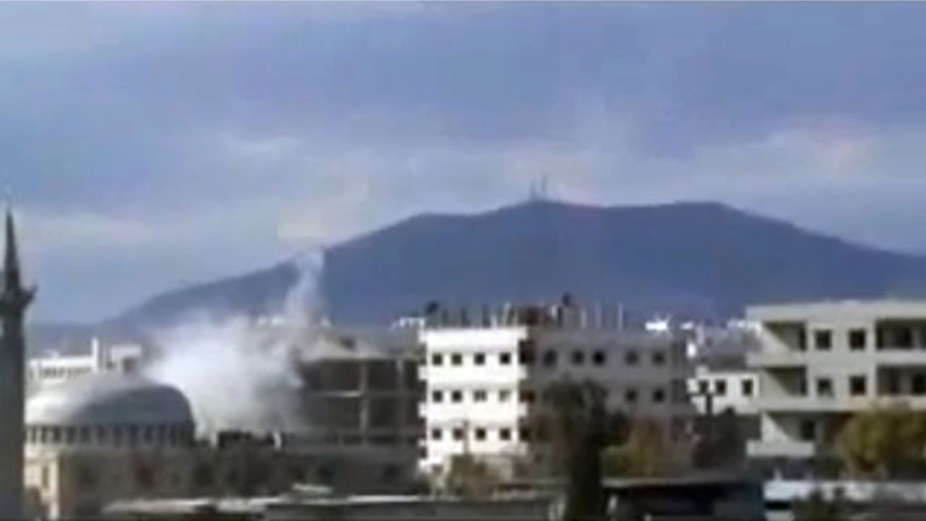 Feb. 6, 2012: This image from amateur video made available by Shaam News Network, purports to show an explosion in Damascus, Syria.