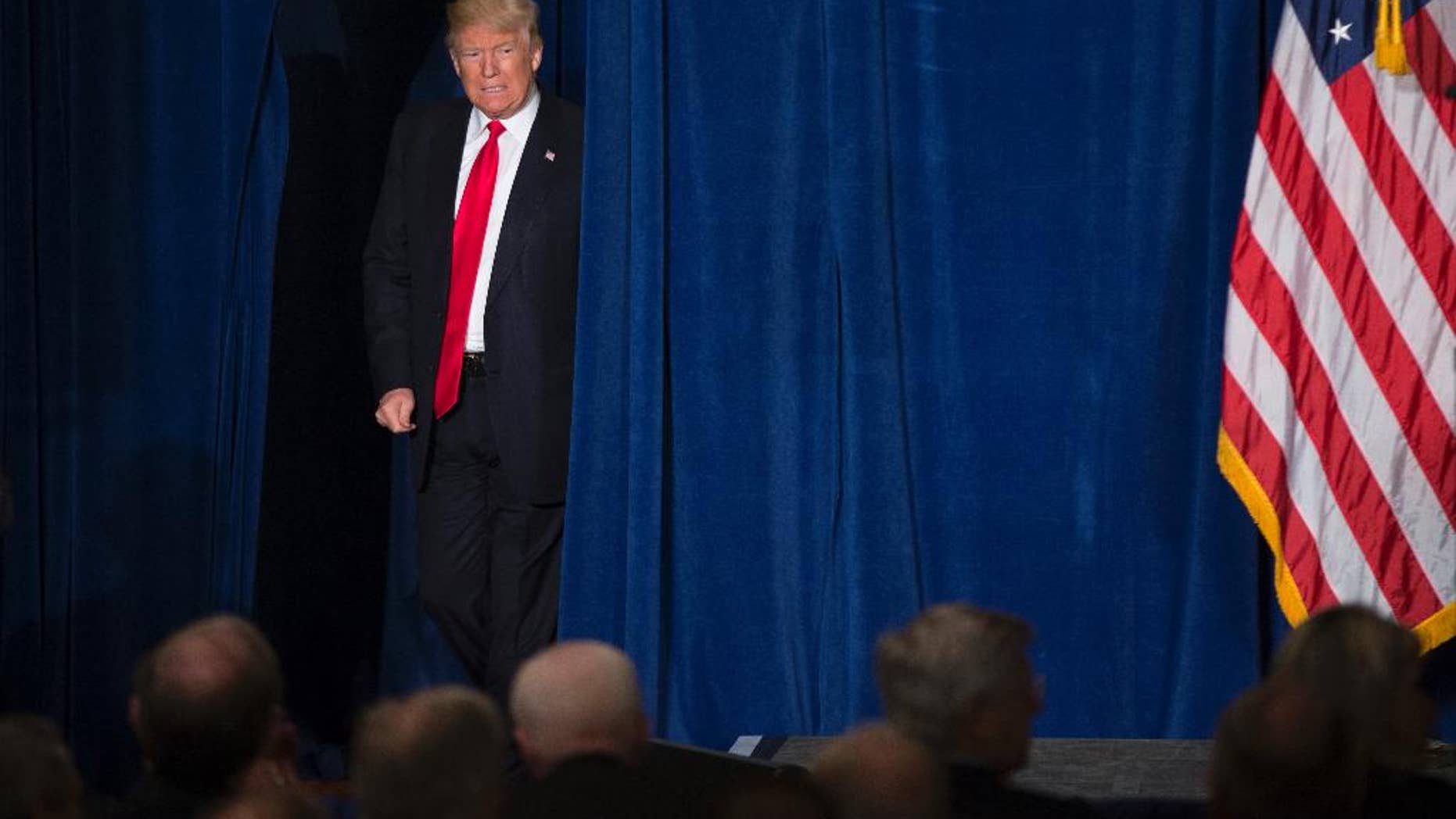 April 27, 2016: Republican presidential candidate Donald Trump arrives to give a foreign policy speech at the Mayflower Hotel in Washington.