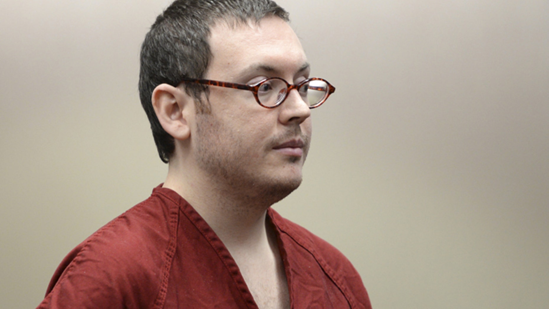 Colorado movie massacre gunman James Holmes listens at a court hearing before beginning his life sentence with no chance of parole, in Centennial, Colorado August 26, 2015.