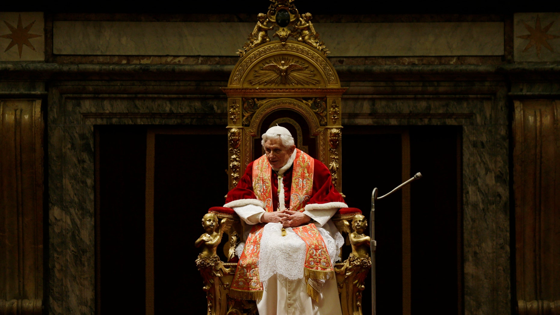 Pope Benedict XVI delivers his message on the occasion of the exchange of Christmas greetings with the Roman curia, in the Clementine hall at Vatican, Friday, Dec. 21, 2012. (AP Photo/Alessandra Tarantino, pool)