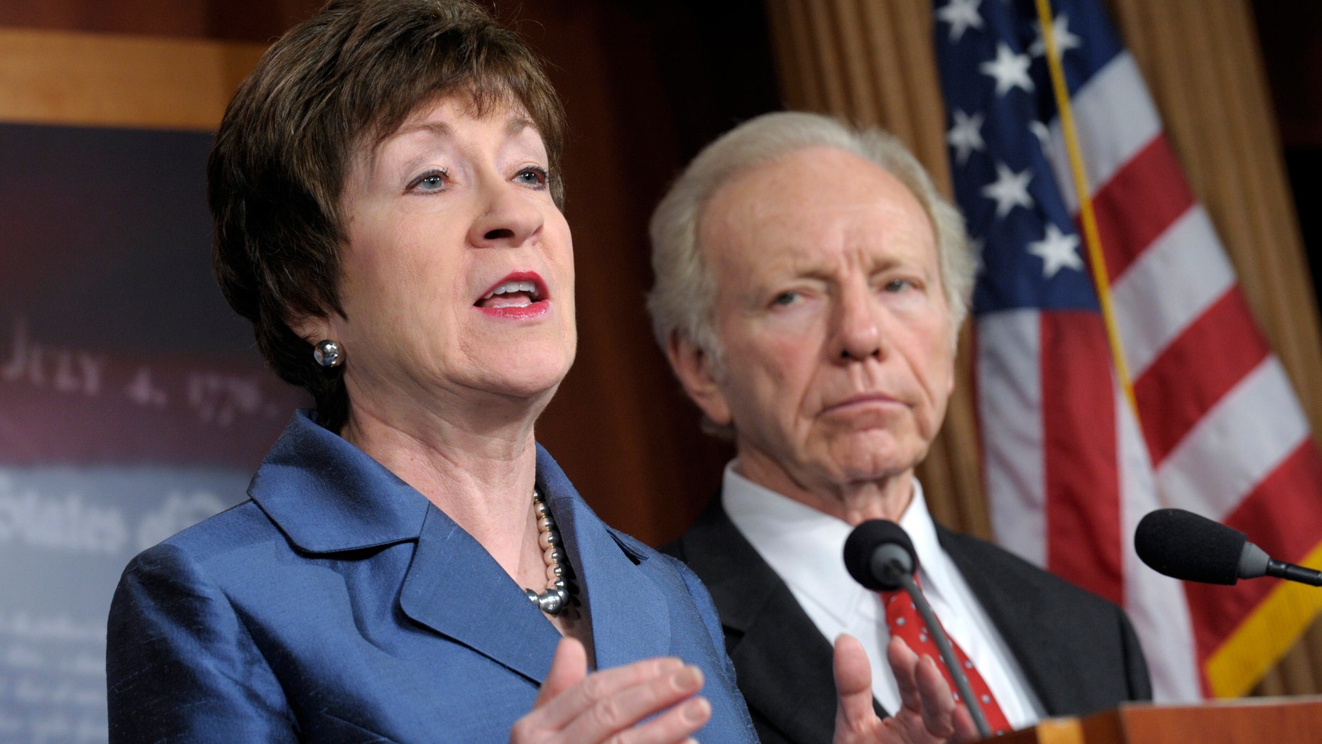 Senate Homeland Security Committee Chairman Sen. Joseph Lieberman, I-Conn. listens at right, as the committee's ranking Republican, Sen. Susan Collins, R-Maine speaks during a news conference on Capitol Hill in Washington, Monday, Dec. 31, 2012, to discuss the committee's report on the security deficiencies at the temporary U.S. Mission in Benghazi, Libya. (AP Photo/Susan Walsh)