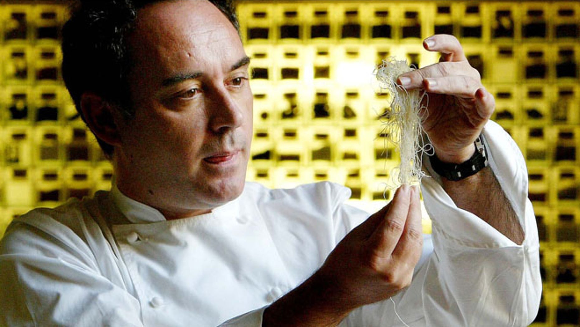 Dec. 5, 2003: Spanish chef Ferran Adria examines ingredients in his kitchen workshop in Barcelona, Spain.