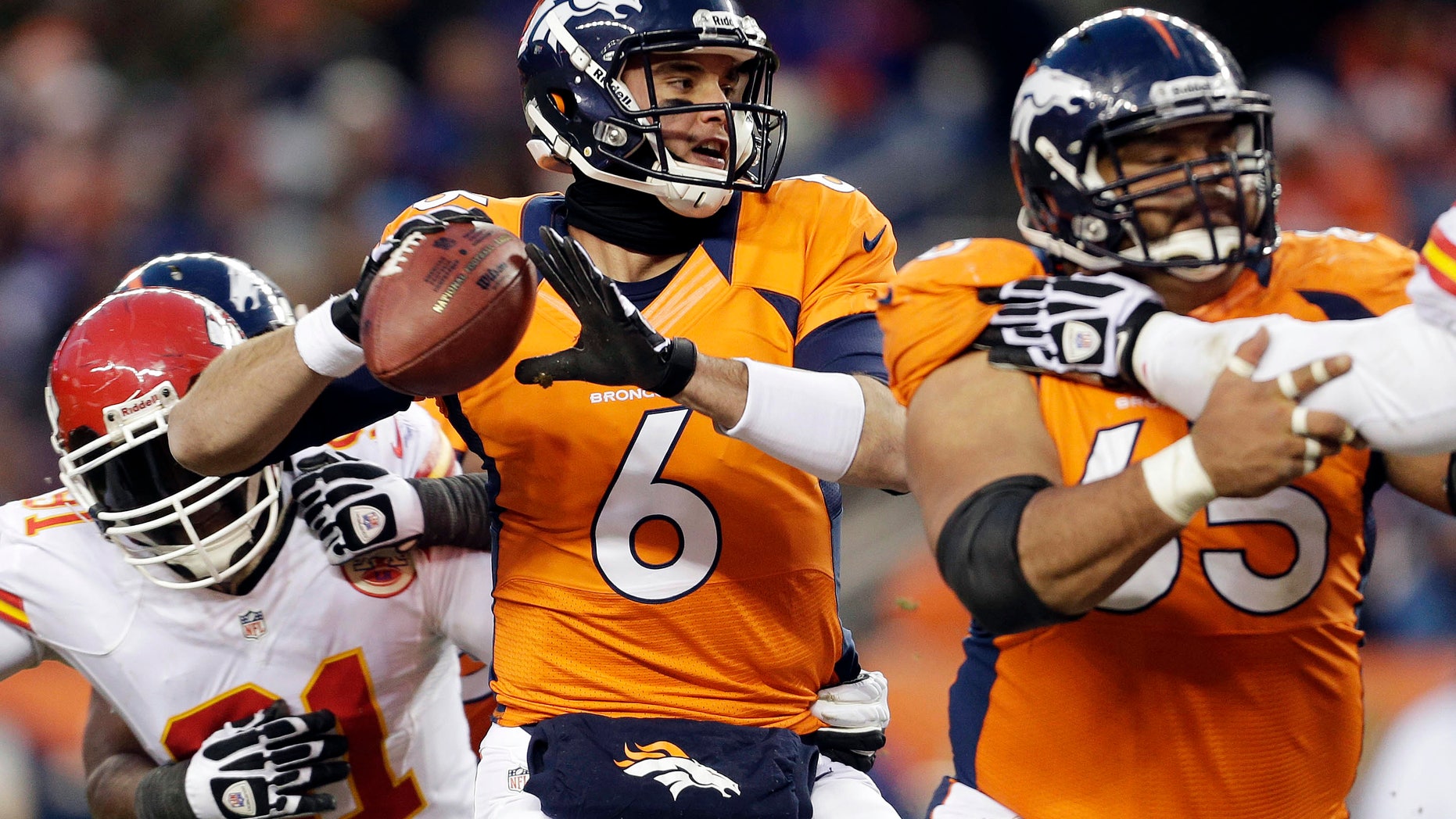 FILE - In this Dec. 30, 2012, file photo, Denver Broncos quarterback Brock Osweiler (6) sets to throw a pass in the fourth quarter of an NFL football game against the Kansas City Chiefs in Denver. All eyes were on Broncos starting quarterback Peyton Manning this season, especially Osweiler's. If, heaven forbid, something should happen to the four-time MVP in the playoffs, the next man up is the four-time passer, a rookie from Arizona State who's biding his time much like Green Bay Packers quarterback Aaron Rodgers did with Brett Favre. (AP Photo/Joe Mahoney, File)