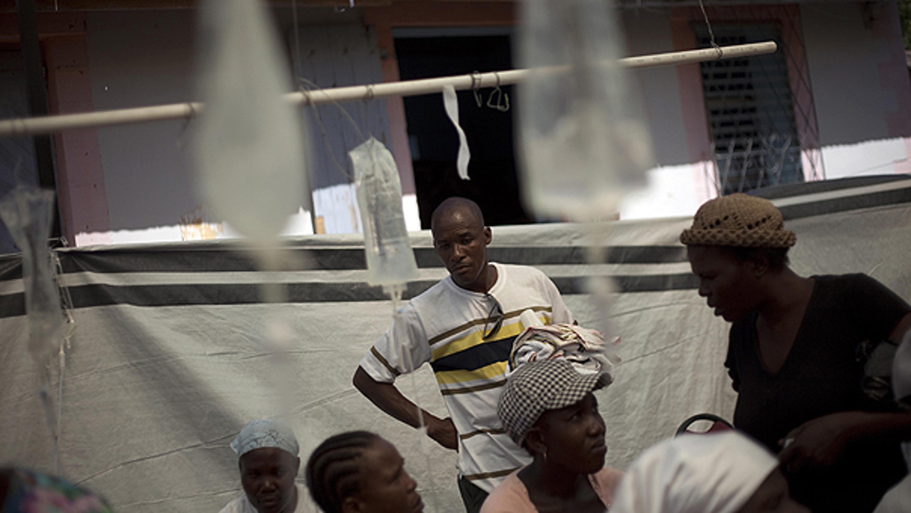 Nov. 8: Patients suffering cholera symptoms receive treatment at the St. Nicholas hospital in Saint Marc, Haiti.