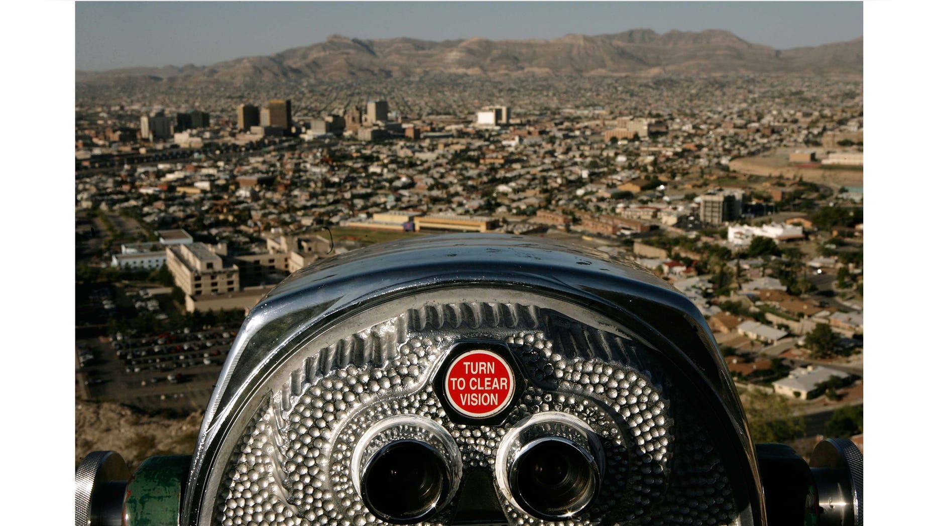 EL PASO, TX - JUNE 26: Early morning light falls over the combined cities of El Paso, Texas, and Ciudad Juarez, Mexico, as seen from the Franklin Mountains June 26, 2007 in El Paso,Texas. Separated by the Rio Grande, the two cities have a combined population of more than 2 million people, with 80 percent of those people being native Spanish speakers. Since the attacks of September 11, 2001, enforcement of the U.S.-Mexico border by the Customs and Border Protection agency has increased, sharply reducing the illegal entry of people and drugs into the United States. (Photo by Chip Somodevilla/Getty Images)