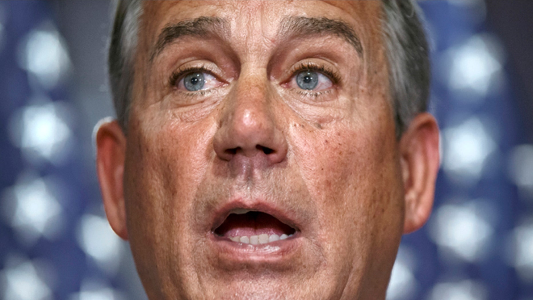 This photo taken July 15, 2014 shows House Speaker John Boehner of Ohio speaking at Republican National Committee headquarters on Capitol Hill in Washington. Constitutional lawyers backing a planned House Republican lawsuit against President Barack Obama told a congressional committee Wednesday that the action is justified because Obama has exceeded his powers in carrying out his health care law. Attorneys allied with Democrats in opposing the election-year suit said it's the GOP that's going too far by trying to resolve a political dispute by handing the question to the federal courts to decide. (AP Photo/J. Scott Applewhite)