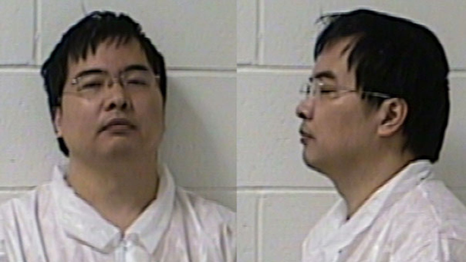 April 26: Lishan Wang is seen in two booking photos. Branford police say Wang, a citizen of China, is charged with murder, attempted murder and firearms offenses in the fatal shooting of Vajinder Toor outside Toor's home in Branford, Conn.