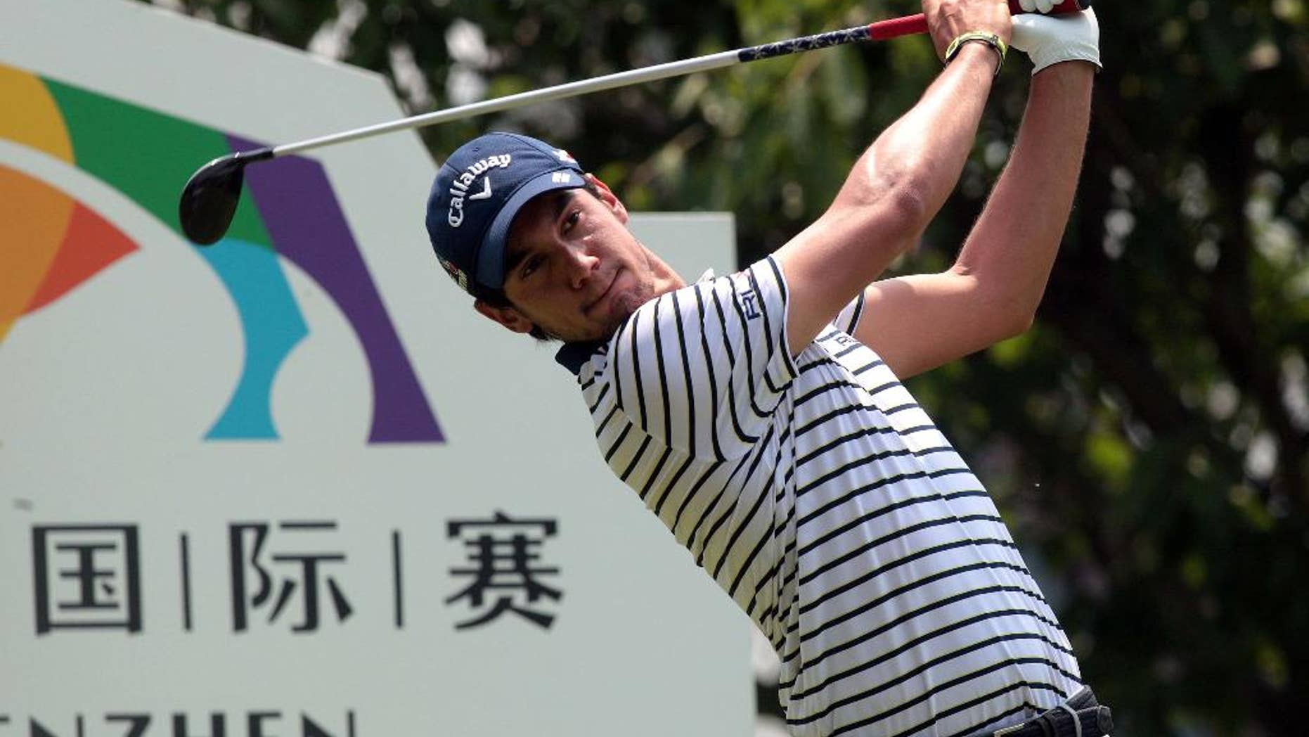 Matteo Manassero of Italy competes during the first round of the Shenzhen International golf tournament at Genzon Golf Club in Shenzhen in southern China's Guangdong Province, Thursday, April 16, 2015. (Chinatopix Via AP) CHINA OUT