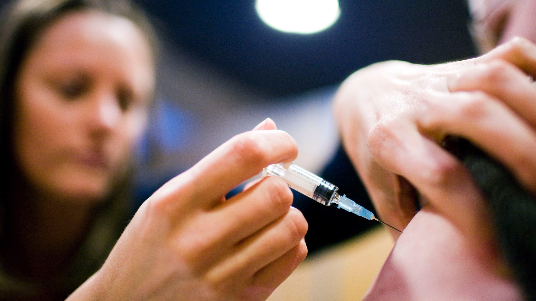 A patient receiving the measles vaccine.